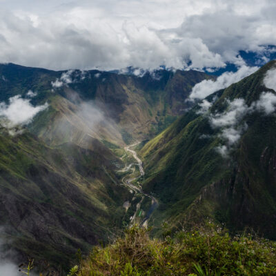 Panoramic view from the top of Machu Picchu mountain, the river and the Hidroelectrica, Peru