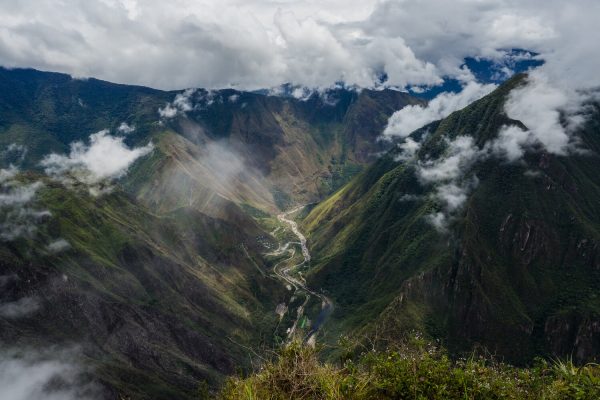 Panoramic view from the top of Machu Picchu mountain, the river and the Hidroelectrica, Peru