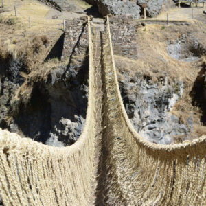 Ancient rustic bulrush sedge suspension bridge