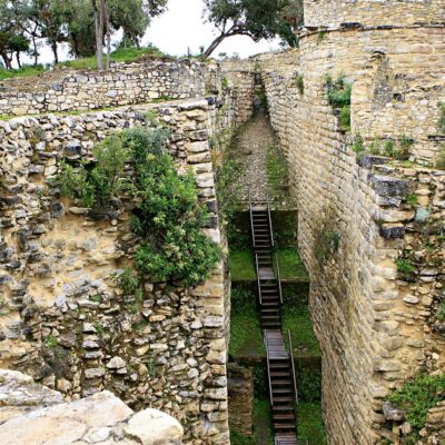 The Kuelap fortress near Chachapoyas, Peru was built by the Chacha people who lived in the fertile cloud forests. The fortress is one of the largest ruins in the world.