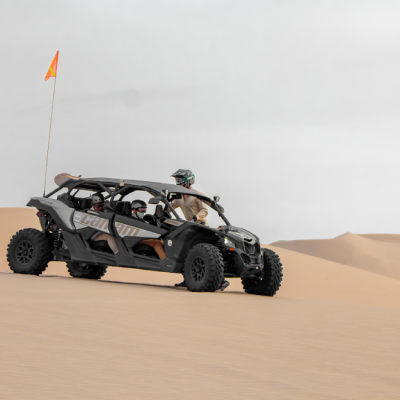 Can-Am dune buggy with passengers on the Huacachina sand dunes, Ica, Peru