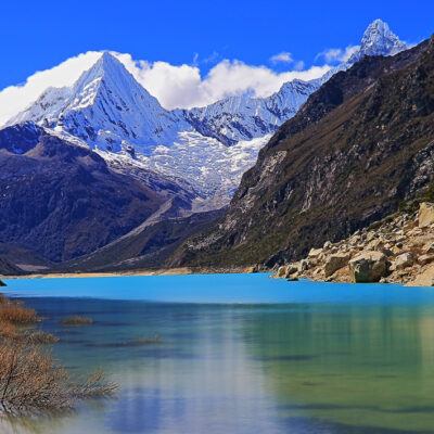 Long exposure: blurred Paron lake in Cordillera Blanca, Pirámide mountain in Andes - Ancash, Peru

Paron lake in Cordillera Blanca, Pirámide snowcapped mountain in Andes - Ancash, Peru

Laguna Parón (Parón lake) is the largest lake in the Cordillera Blanca, on the Peruvian Andes, near Huaraz, at 4185 m.